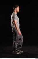  Larry Steel  1 boots dressed grey camo trousers grey t shirt shoes side view walking whole body 0003.jpg